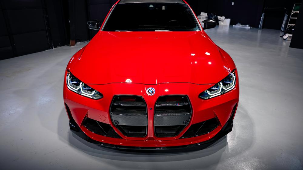 Detail of paint protection film application on BMW M3 Competition